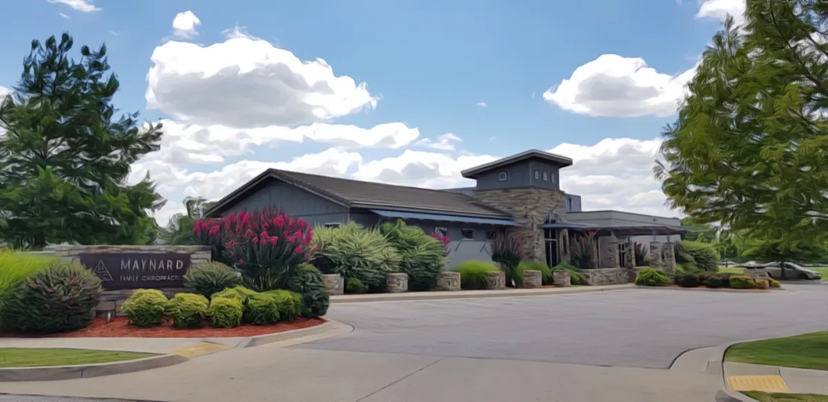 Stone and dark wood exterior of the Maynard Family Chiropractic clinic at 4705 West Urbana Street, Broken Arrow, OK 74012-5998